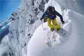 Nicolas Falquet Skiing Off a Peak At Les Marécottes in Switzerland